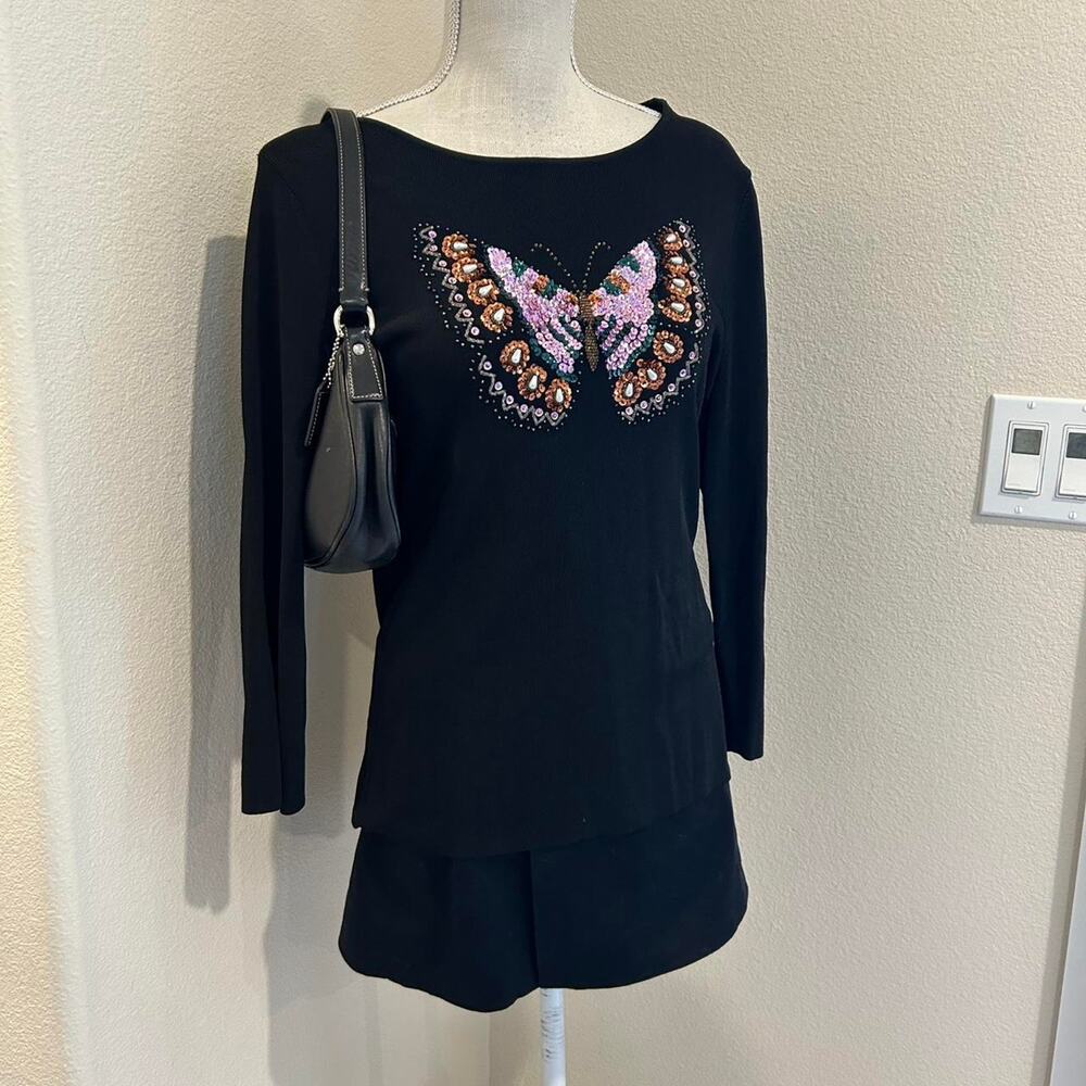 Lucia burns black ribbed quarter sleeve top. Size XL